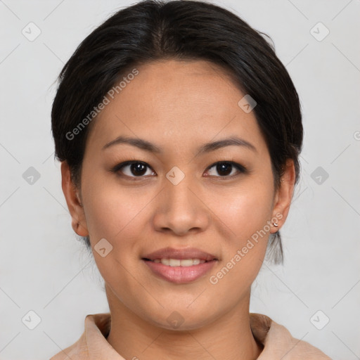 Joyful asian young-adult female with medium  brown hair and brown eyes