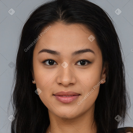 Joyful asian young-adult female with long  brown hair and brown eyes