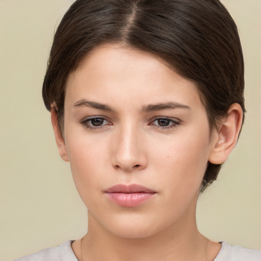 Neutral white young-adult female with medium  brown hair and brown eyes