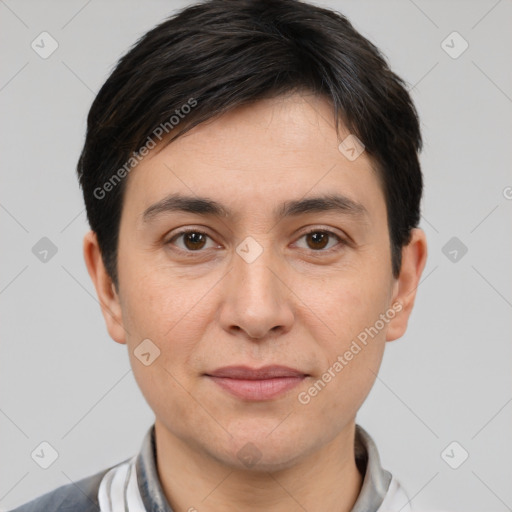 Joyful white adult male with short  brown hair and brown eyes