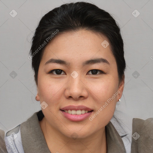 Joyful asian young-adult female with medium  brown hair and brown eyes