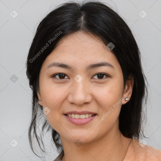 Joyful asian young-adult female with medium  brown hair and brown eyes