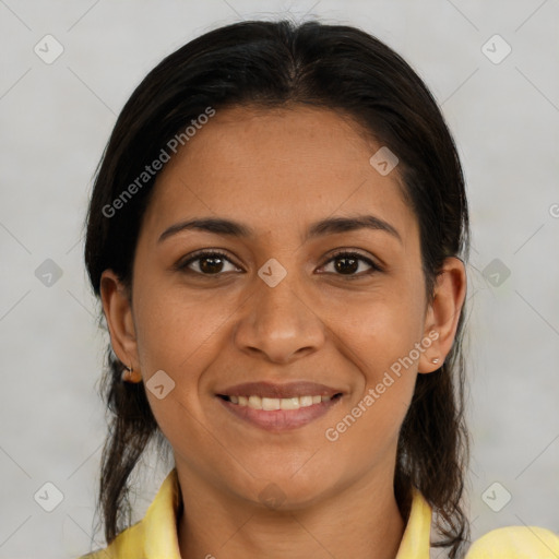 Joyful latino young-adult female with medium  brown hair and brown eyes