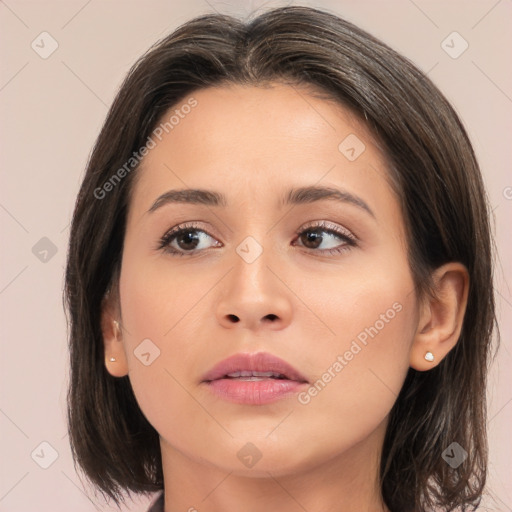 Neutral white young-adult female with medium  brown hair and brown eyes