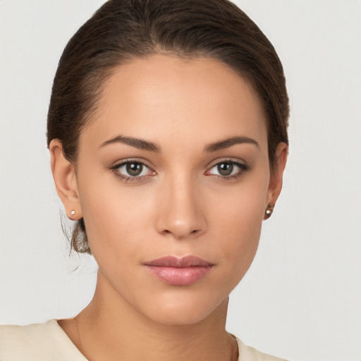 Neutral white young-adult female with medium  brown hair and brown eyes