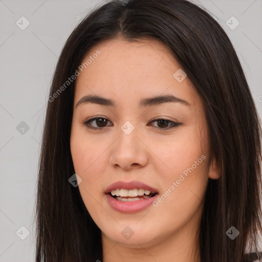 Joyful asian young-adult female with long  brown hair and brown eyes