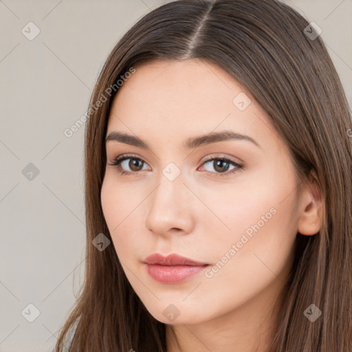 Neutral white young-adult female with long  brown hair and brown eyes