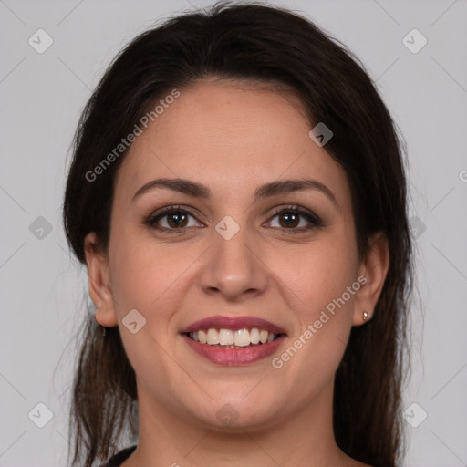 Joyful white young-adult female with medium  brown hair and brown eyes