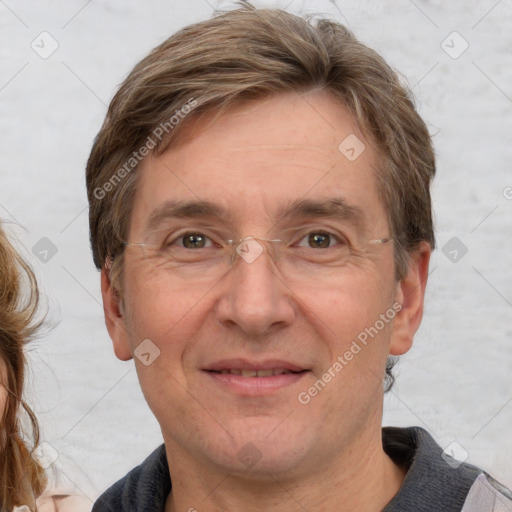 Joyful white adult male with short  brown hair and grey eyes