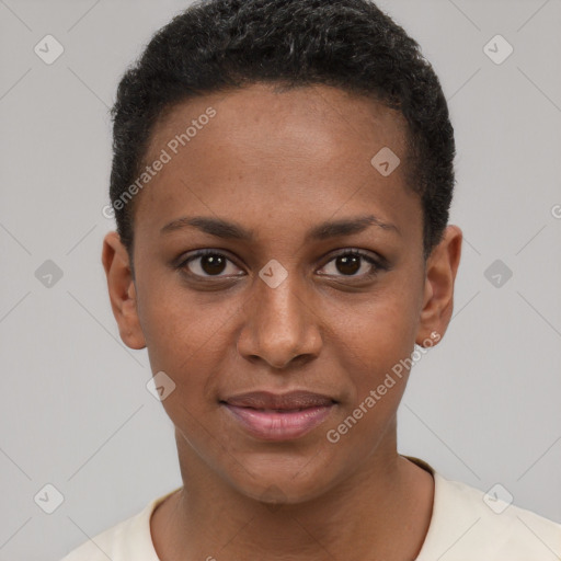 Joyful black young-adult female with short  brown hair and brown eyes