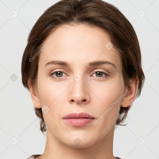 Neutral white young-adult female with medium  brown hair and grey eyes