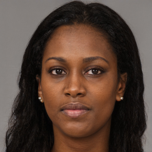 Neutral black young-adult female with long  black hair and brown eyes