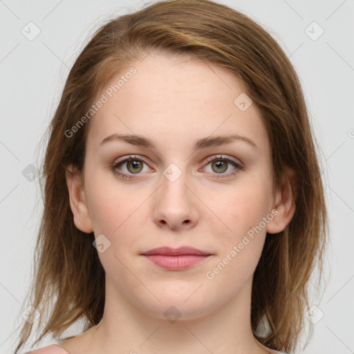 Joyful white young-adult female with medium  brown hair and green eyes