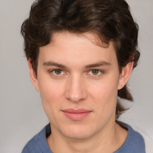 Neutral white young-adult male with medium  brown hair and brown eyes