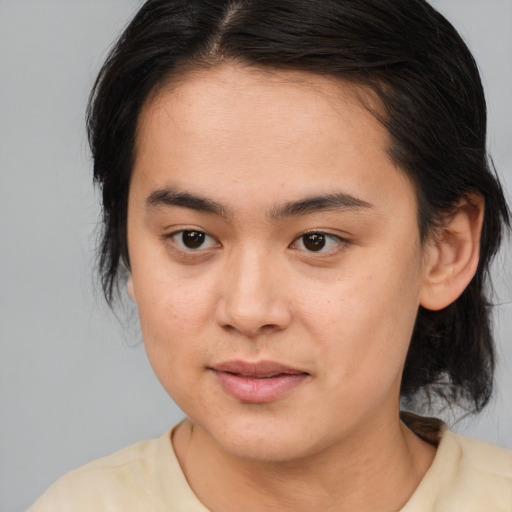 Joyful white young-adult female with medium  brown hair and brown eyes