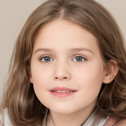 Joyful white child female with long  brown hair and blue eyes