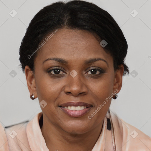 Joyful black adult female with short  brown hair and brown eyes