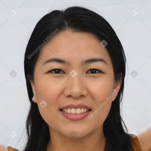 Joyful asian young-adult female with long  black hair and brown eyes