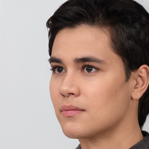 Neutral white young-adult male with short  black hair and brown eyes
