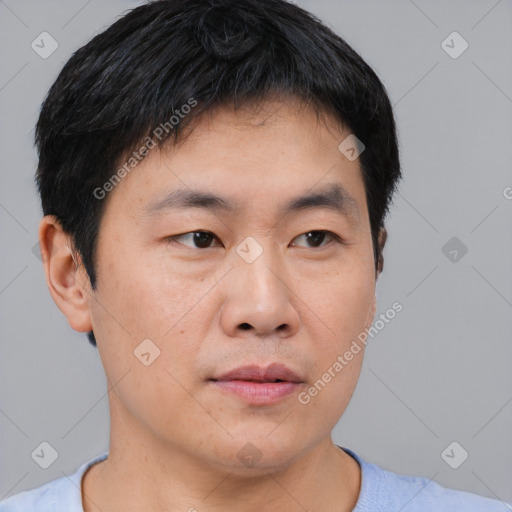 Neutral asian young-adult male with short  black hair and brown eyes