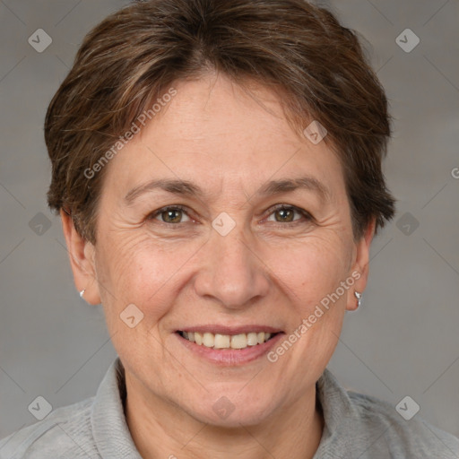 Joyful white adult female with short  brown hair and brown eyes