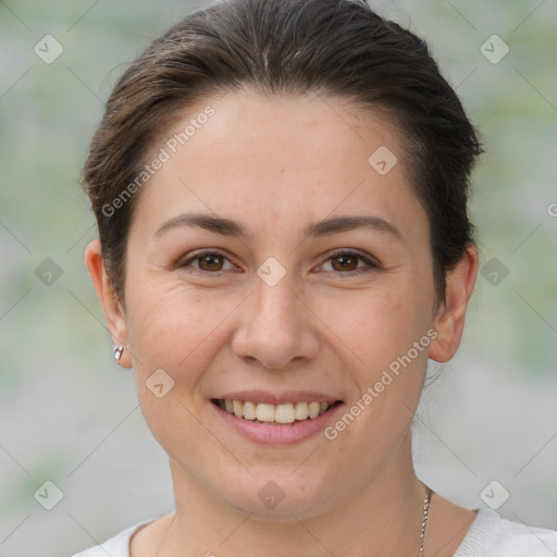 Joyful white young-adult female with short  brown hair and brown eyes