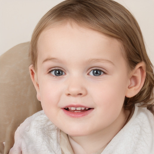 Joyful white child female with medium  brown hair and grey eyes