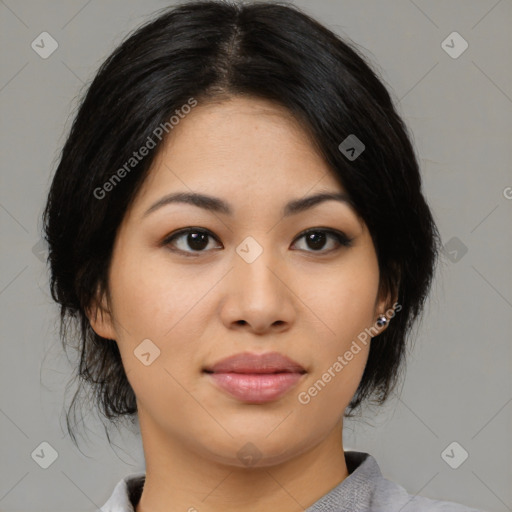 Joyful asian young-adult female with medium  black hair and brown eyes