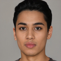 Neutral latino young-adult male with short  black hair and brown eyes