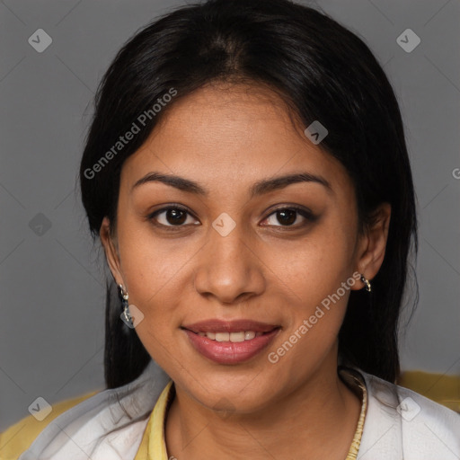 Joyful latino young-adult female with medium  brown hair and brown eyes