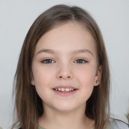 Joyful white child female with long  brown hair and grey eyes