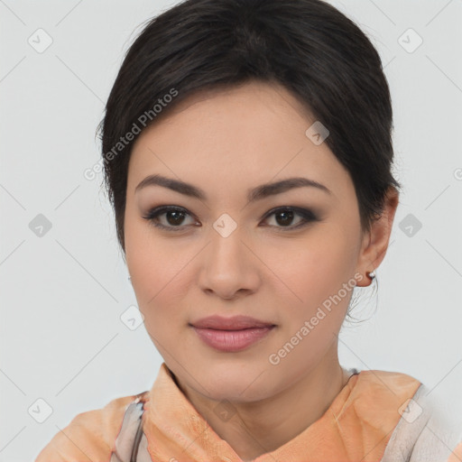 Joyful latino young-adult female with medium  brown hair and brown eyes