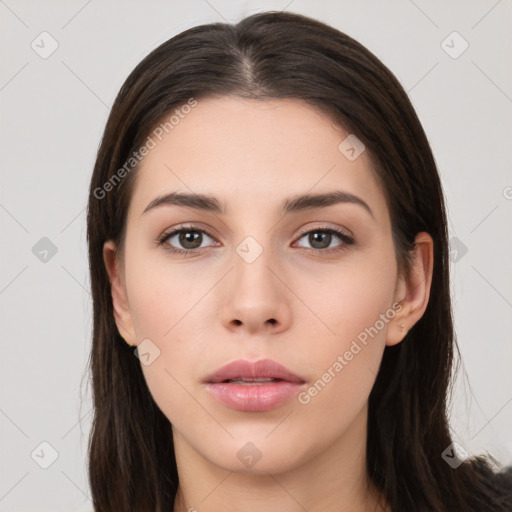 Neutral white young-adult female with long  brown hair and brown eyes