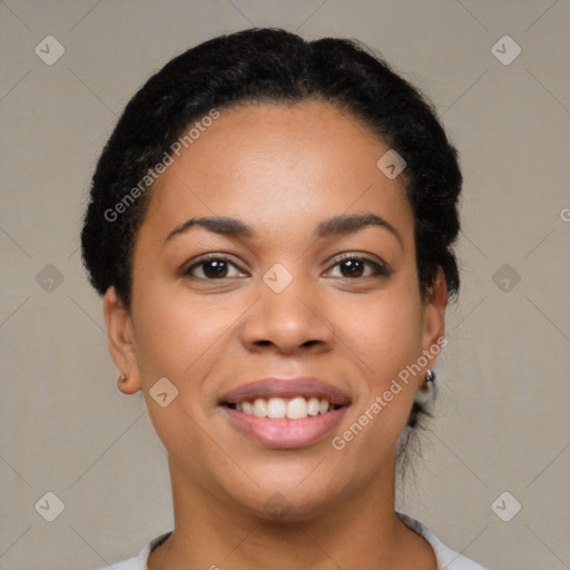 Joyful latino young-adult female with short  brown hair and brown eyes