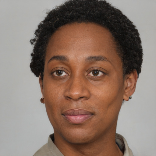Neutral black adult female with short  black hair and brown eyes
