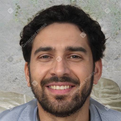 Joyful white young-adult male with short  black hair and brown eyes