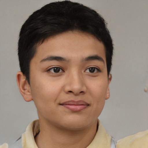 Joyful asian young-adult female with short  brown hair and brown eyes