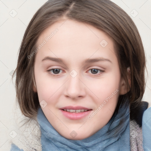 Joyful white young-adult female with medium  brown hair and blue eyes