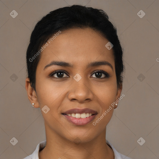 Joyful latino young-adult female with short  black hair and brown eyes