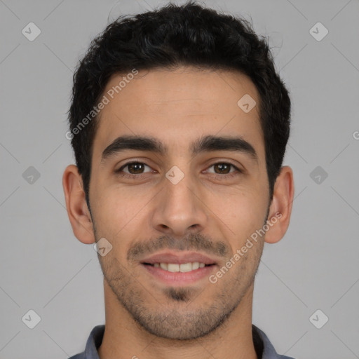 Joyful white young-adult male with short  black hair and brown eyes