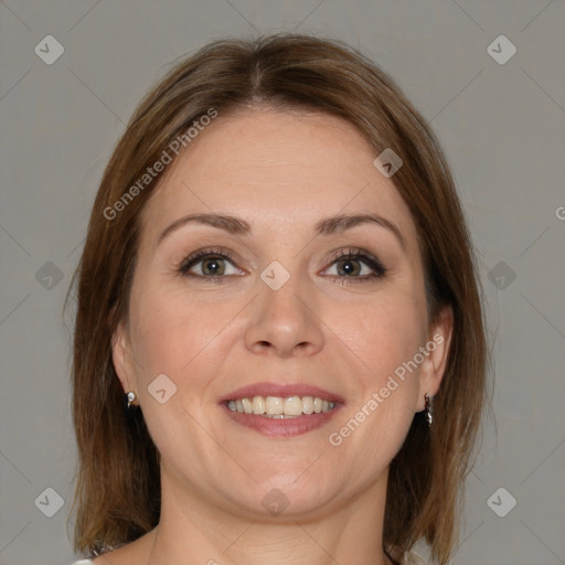 Joyful white adult female with medium  brown hair and grey eyes