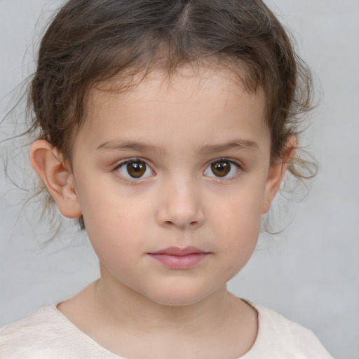 Neutral white child female with medium  brown hair and brown eyes