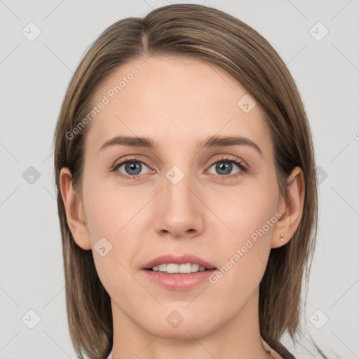 Joyful white young-adult female with medium  brown hair and grey eyes