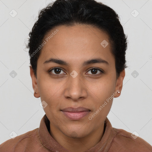 Joyful latino young-adult female with short  brown hair and brown eyes