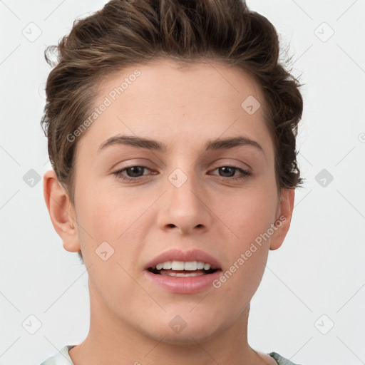 Joyful white young-adult female with short  brown hair and grey eyes