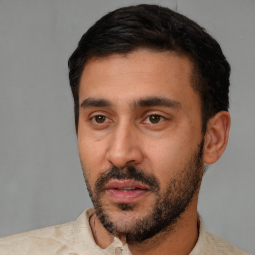 Neutral latino young-adult male with short  black hair and brown eyes