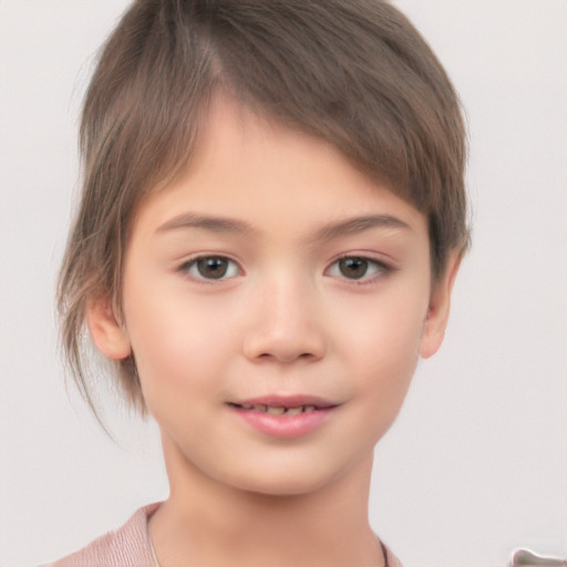 Joyful white child female with short  brown hair and brown eyes