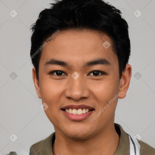 Joyful asian young-adult male with short  black hair and brown eyes