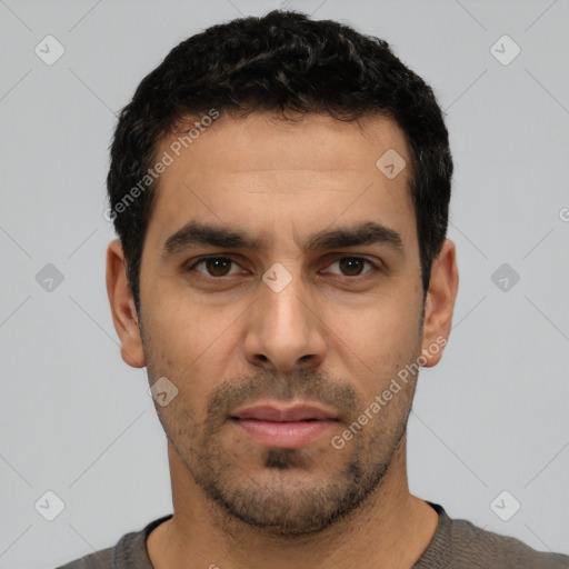 Neutral white young-adult male with short  black hair and brown eyes
