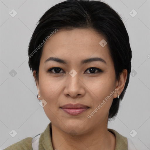 Joyful latino young-adult female with medium  black hair and brown eyes